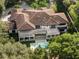 Luxury home with tile roof, pool, and private backyard at 5121 Latrobe Dr, Windermere, FL 34786