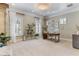 Well-lit home office with built-in shelving and a large work desk at 5121 Latrobe Dr, Windermere, FL 34786