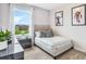 Cozy bedroom with a comfortable bed and plenty of natural light at 2563 Sage Valley Way, Winter Haven, FL 33884