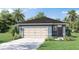 One-story home with a two-car garage and attractive landscaping at 2563 Sage Valley Way, Winter Haven, FL 33884