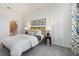 Bedroom with wood bed frame, shiplap wall, and window at 5945 Cliffbow Loop, Leesburg, FL 34748