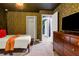 Charming bedroom with a brick feature wall and ample closet space at 1406 Moon Valley Dr, Davenport, FL 33896