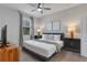 King-size bed, large window, and plenty of space for your comfort at 1406 Moon Valley Dr, Davenport, FL 33896