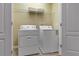 Convenient laundry room with washer and dryer at 1406 Moon Valley Dr, Davenport, FL 33896