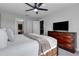 King bedroom with TV and ensuite bathroom access at 1406 Moon Valley Dr, Davenport, FL 33896