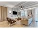Modern living room with comfortable seating and large TV at 1406 Moon Valley Dr, Davenport, FL 33896