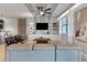 Spacious living room featuring a comfortable sectional sofa and modern coffee table at 1406 Moon Valley Dr, Davenport, FL 33896