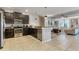Modern kitchen with stainless steel appliances and island at 1406 Moon Valley Dr, Davenport, FL 33896