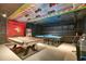 Game room with pool table, ping pong table, and race car decor at 1406 Moon Valley Dr, Davenport, FL 33896