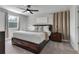 King bedroom with ensuite bathroom and modern furnishings at 1406 Moon Valley Dr, Davenport, FL 33896