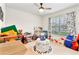 ' playroom with lots of toys and colorful decor at 1220 Sugarwood St, Davenport, FL 33837
