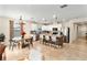 Open concept kitchen with island, stainless steel appliances, and breakfast nook at 1220 Sugarwood St, Davenport, FL 33837
