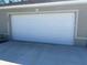 View of the home's attached two-car garage at 3402 Sw 165Th Loop, Ocala, FL 34473