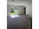 Bright living room with sliding glass door leading to backyard at 3402 Sw 165Th Loop, Ocala, FL 34473