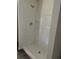 Shower stall with built-in shelves, offering convenient storage at 3402 Sw 165Th Loop, Ocala, FL 34473