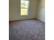 Bright bedroom with window and closet at 3402 Sw 165Th Loop, Ocala, FL 34473