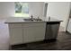 Kitchen island with double sink and stainless steel dishwasher at 3402 Sw 165Th Loop, Ocala, FL 34473