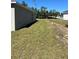 Spacious side yard with new home and grassy area at 3402 Sw 165Th Loop, Ocala, FL 34473
