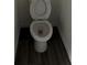 Simple and clean toilet in a small bathroom at 3402 Sw 165Th Loop, Ocala, FL 34473