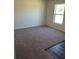 Spacious bedroom with neutral carpeting and large window at 3402 Sw 165Th Loop, Ocala, FL 34473