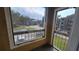 View from screened balcony of community grounds and buildings at 5600 Devonbriar Way # N202, Orlando, FL 32822