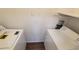 Laundry room with washer and dryer included at 5600 Devonbriar Way # N202, Orlando, FL 32822