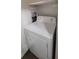 White energy-efficient electric dryer at 5600 Devonbriar Way # N202, Orlando, FL 32822