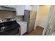 Modern kitchen featuring stainless steel appliances at 5600 Devonbriar Way # N202, Orlando, FL 32822