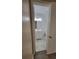 Clean bathroom with white vanity and marble-look floor at 5600 Devonbriar Way # N202, Orlando, FL 32822