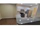 Kitchen with stainless steel appliances and granite countertops at 5600 Devonbriar Way # N202, Orlando, FL 32822