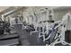 Well-equipped fitness center with various cardio and weight machines at 5600 Devonbriar Way # N202, Orlando, FL 32822