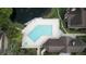 Relaxing community pool with spacious deck at 5600 Devonbriar Way # N202, Orlando, FL 32822