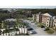 Complex with pool, parking and lush landscaping at 5600 Devonbriar Way # N202, Orlando, FL 32822