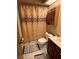 Clean bathroom with shower/tub and wood vanity at 458 Windmeadows St, Altamonte Springs, FL 32701