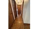 Condo hallway with wood-look tile flooring and doors at 458 Windmeadows St, Altamonte Springs, FL 32701