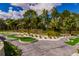 Outdoor mini golf course with green turf and sand pathways at 314 Captiva Dr, Davenport, FL 33896