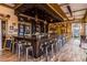Indoor bar with nautical theme and metal stools at 314 Captiva Dr, Davenport, FL 33896