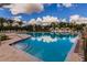 Resort-style pool with cabanas and lounge chairs at 314 Captiva Dr, Davenport, FL 33896