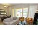 Bright living room featuring a comfy sofa and plenty of natural light at 314 Captiva Dr, Davenport, FL 33896