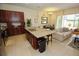 Open concept kitchen with a large island, stainless steel appliances, and view of living area at 314 Captiva Dr, Davenport, FL 33896
