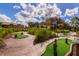 Outdoor mini golf course with green turf and wood features at 314 Captiva Dr, Davenport, FL 33896