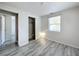 Bedroom with large closet and access to another room at 653 W Thomas St, Lakeland, FL 33805
