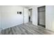 Bedroom with closet and access to another room at 653 W Thomas St, Lakeland, FL 33805