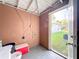 Partially finished basement offering extra storage and potential workshop space at 653 W Thomas St, Lakeland, FL 33805