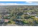 Wider aerial view of the house and surrounding area at 653 W Thomas St, Lakeland, FL 33805