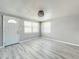 Bright living room featuring hardwood floors and neutral walls at 653 W Thomas St, Lakeland, FL 33805