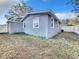 Gray house with a fenced backyard at 653 W Thomas St, Lakeland, FL 33805