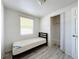 Cozy bedroom with a twin bed and built-in closet at 653 W Thomas St, Lakeland, FL 33805