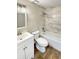 Updated bathroom with marble tile and new fixtures at 511 W Gardenia Dr, Orange City, FL 32763