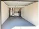 Attached garage with washer and dryer hookups at 511 W Gardenia Dr, Orange City, FL 32763